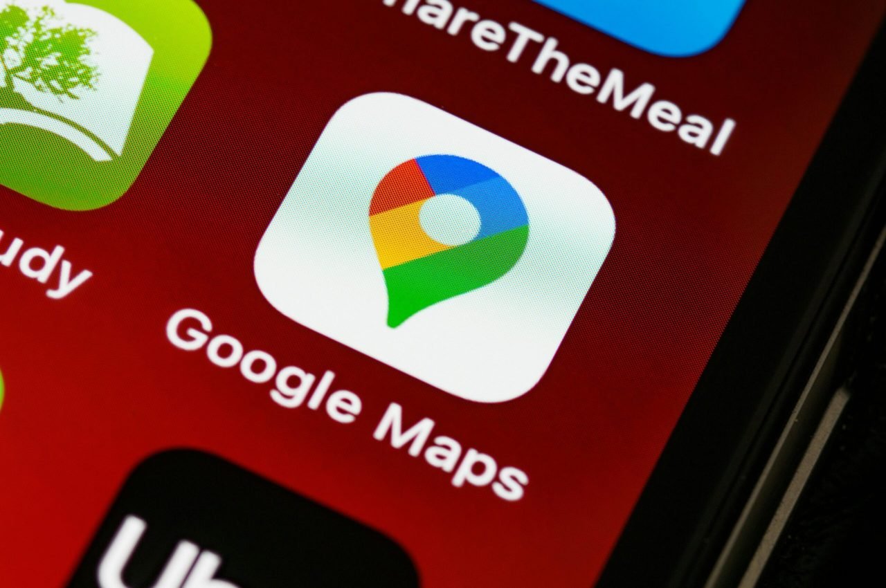 Detailed view of Google Maps app icon on a smartphone screen, showcasing digital navigation technology.